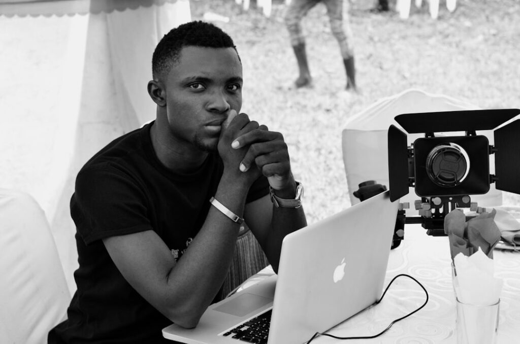 African creative professional working with digital technology